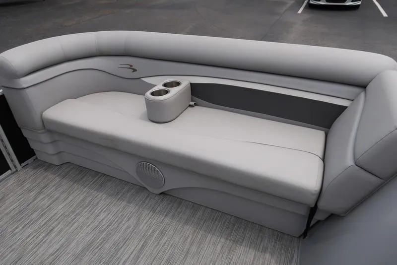 Slide: The Image of 2020 Bennington 20 SLV boat interior with gray seating and cup holders. - 9