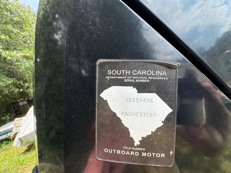 Slide: The Image of Sticker on a 2017 Mako Pro Skiff 19 CC, South Carolina serial number. - 4