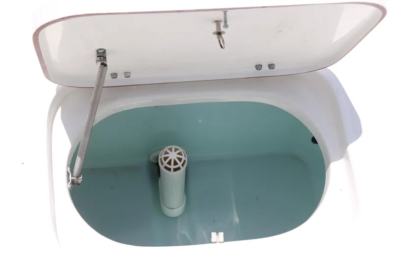 Slide: The Image of Open storage compartment in 2011 Sea Hunt XP-21 boat. - 29