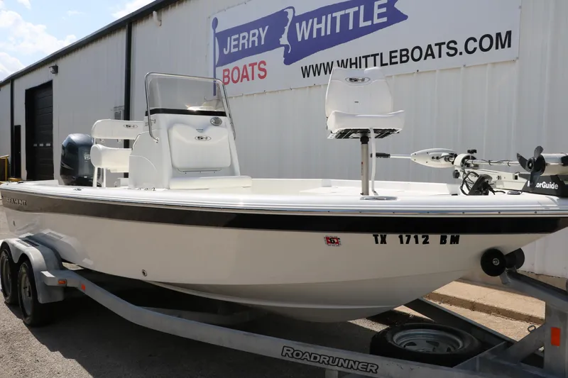 Slide: The Image of 2011 Sea Hunt XP-21 boat on trailer at Jerry Whittle Boats dealership. - 37