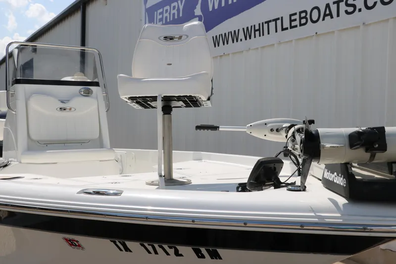 Slide: The Image of 2011 Sea Hunt XP-21 boat with seating and MotorGuide trolling motor, displayed at Whittle Boats. - 38