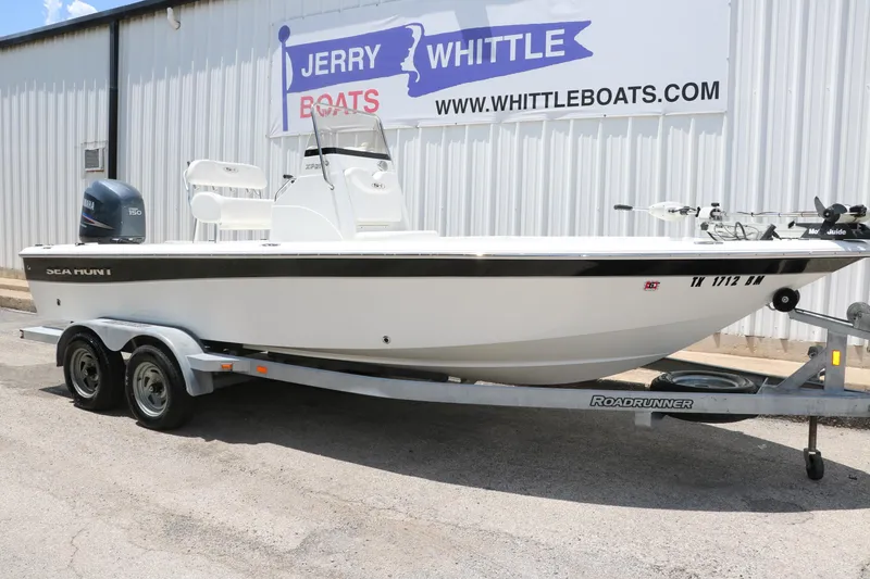 Slide: The Image of 2011 Sea Hunt XP-21 boat on trailer outside Jerry Whittle Boats dealership. - 4