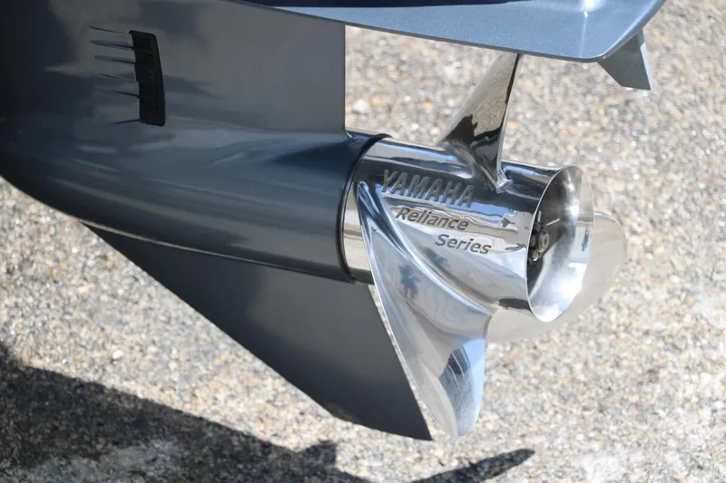 Slide: The Image of Yamaha Reliance Series propeller on 2011 Sea Hunt XP-21 boat, close-up view. - 9