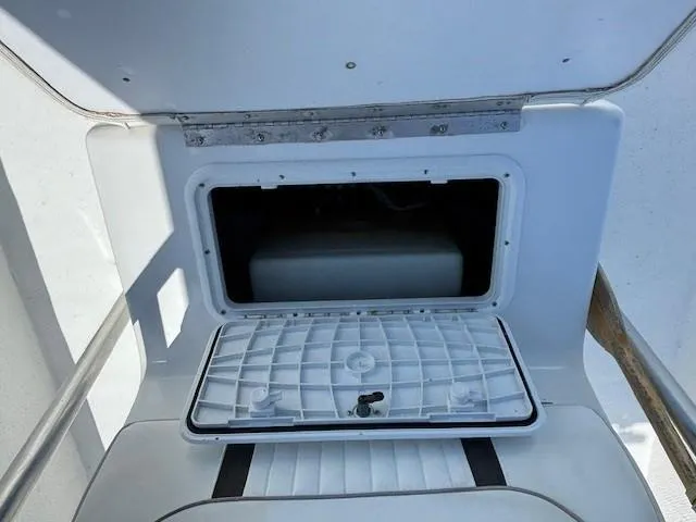 Slide: The Image of Close-up of a mounted light fixture on a 2008 Carolina Skiff 218 DLV boat. - 15