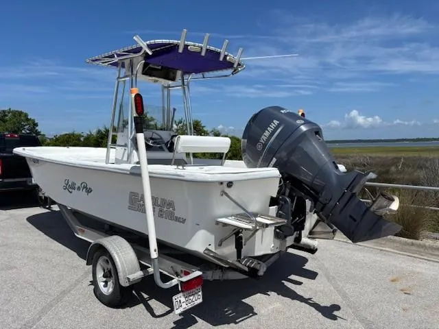 Slide: The Image of 2008 Carolina Skiff 218DLV boat on trailer with Yamaha outboard motor. - 3
