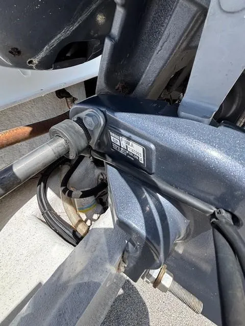 Slide: The Image of Close-up of a 2008 Carolina Skiff 218DLV boat engine component. - 33