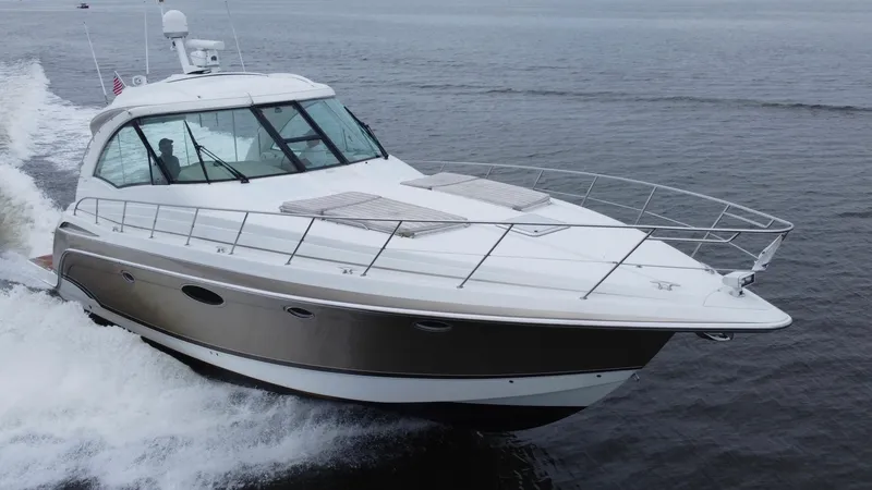 Slide: The Image of 2008 Formula 45 Yacht cruising on open water, showcasing sleek design and luxury features. - 11