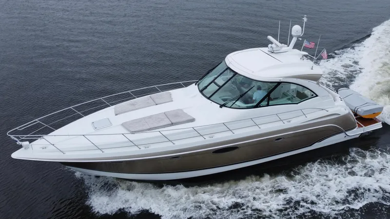 Slide: The Image of 2008 Formula 45 Yacht cruising on open water, showcasing sleek design and luxury features. - 17