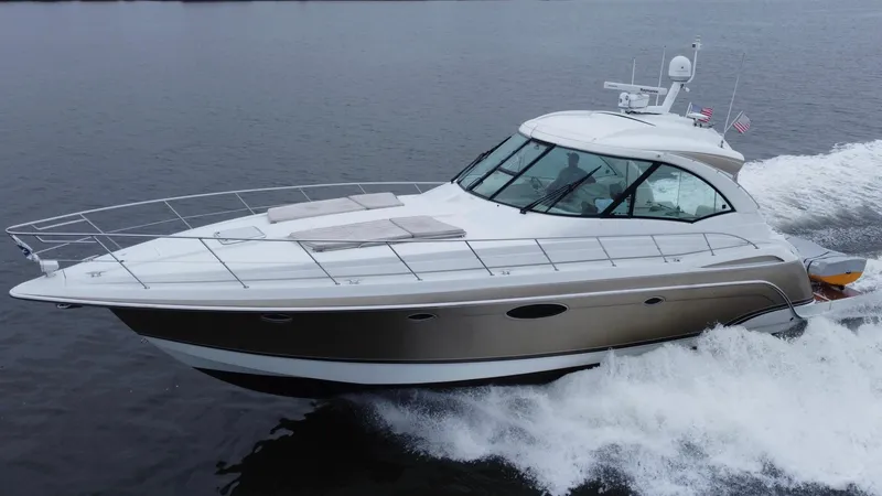 Slide: The Image of 2008 Formula 45 Yacht cruising on open water, showcasing sleek design and performance. - 3