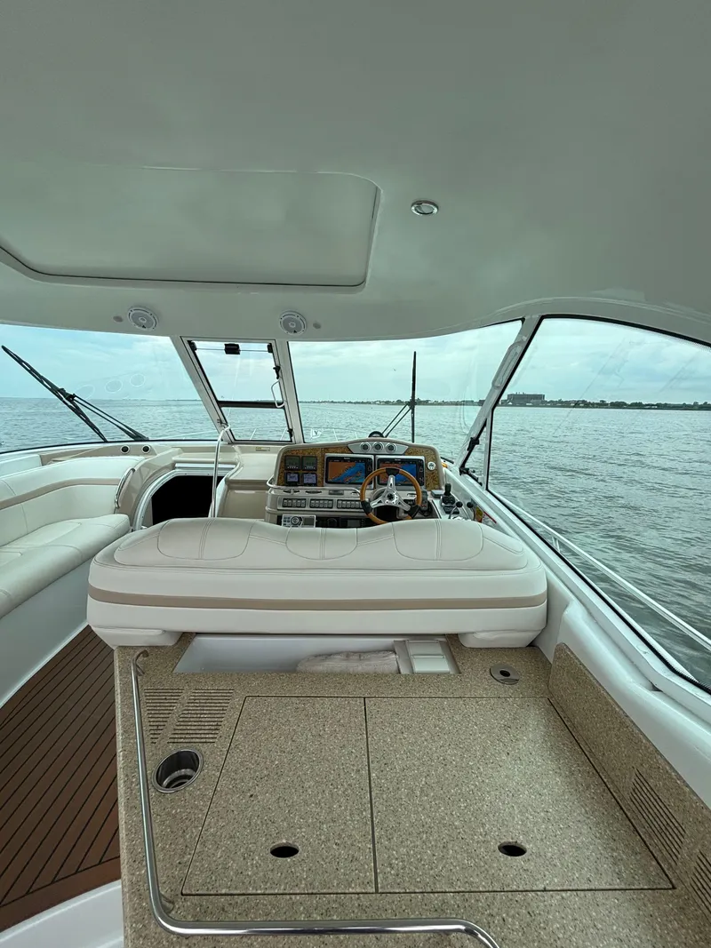 Slide: The Image of Interior view of 2008 Formula 45 Yacht cockpit with steering wheel and seating. - 35