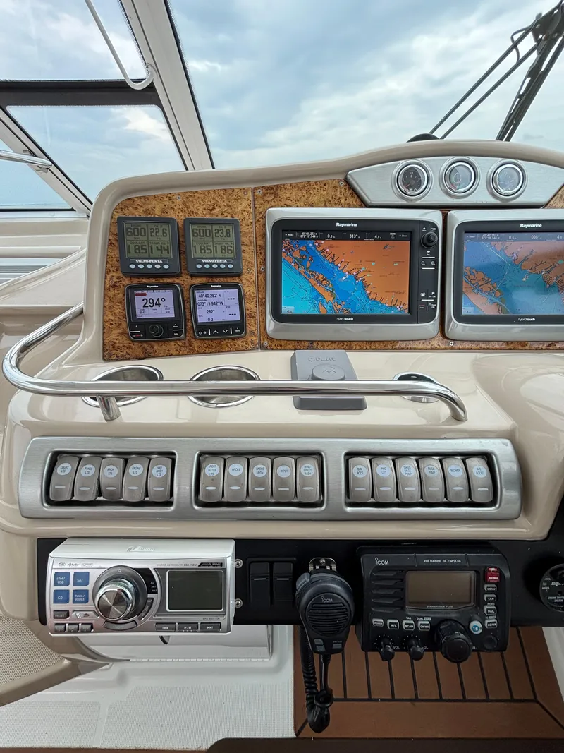 Slide: The Image of Control panel of a 2008 Formula 45 Yacht with navigation screens and instruments. - 37