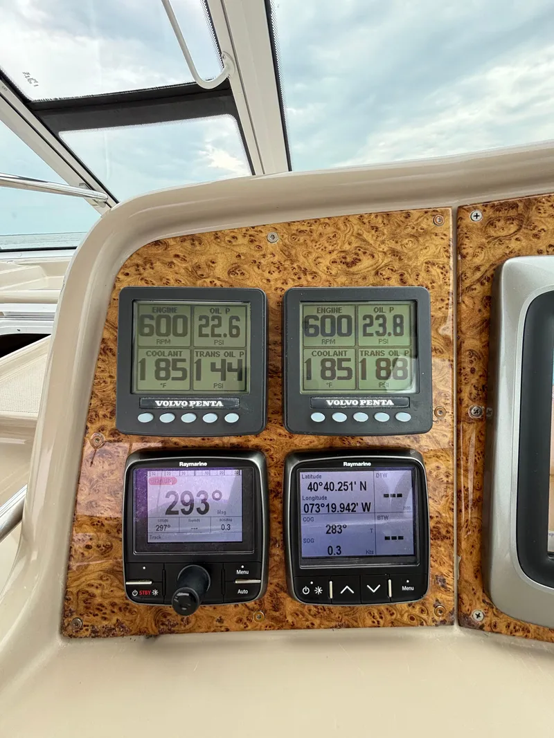 Slide: The Image of Control panel of a 2008 Formula 45 Yacht with navigation and engine displays. - 38
