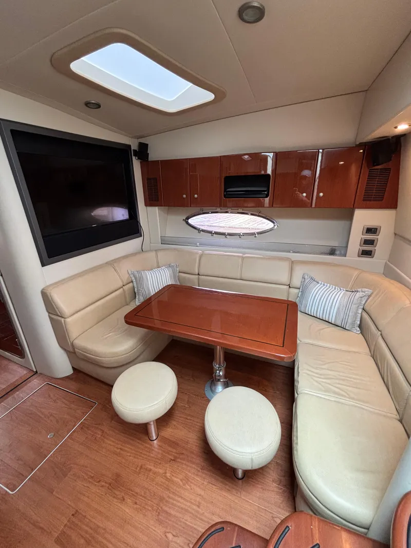 Slide: The Image of Luxurious interior of 2008 Formula 45 Yacht with leather seating and wooden table. - 47