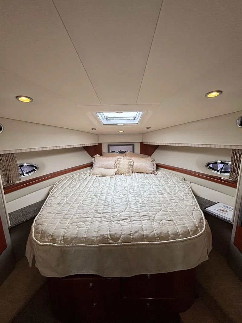 Slide: The Image of Luxurious bedroom interior of 2008 Formula 45 Yacht with elegant bedding and ambient lighting. - 56