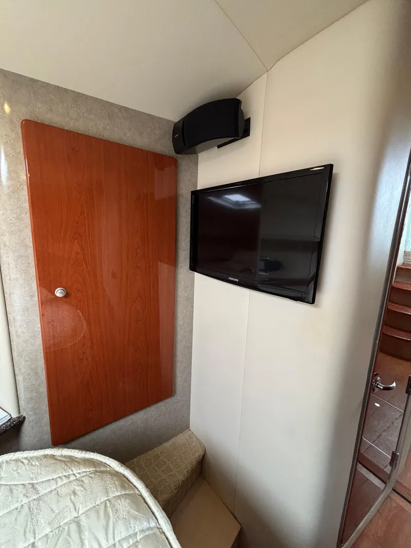 Slide: The Image of Interior of 2008 Formula 45 Yacht with TV and wooden paneling. - 59