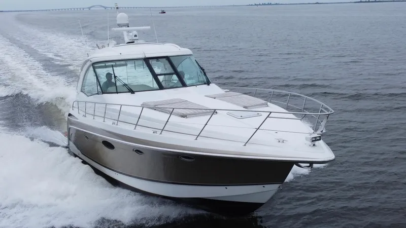 Slide: The Image of 2008 Formula 45 Yacht cruising on open water, showcasing sleek design and powerful performance. - 9