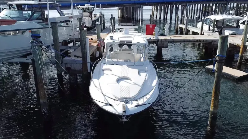 Slide: The Image of 2006 Hydra-Sports Vector 3300 VX boat docked at a marina. - 7