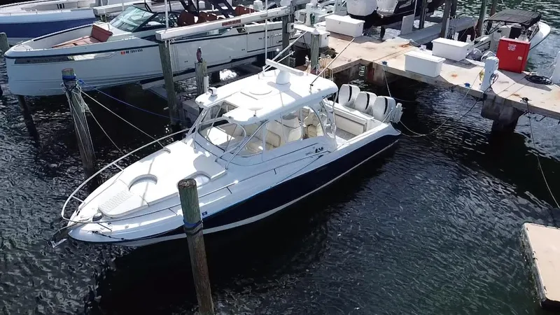 Slide: The Image of 2006 Hydra-Sports Vector 3300 VX boat docked at marina, aerial view. - 8