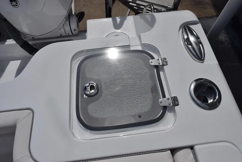 Slide: The Image of 2026 Sea Hunt Gamefish 27 boat detail with forward seating and storage compartment. - 23