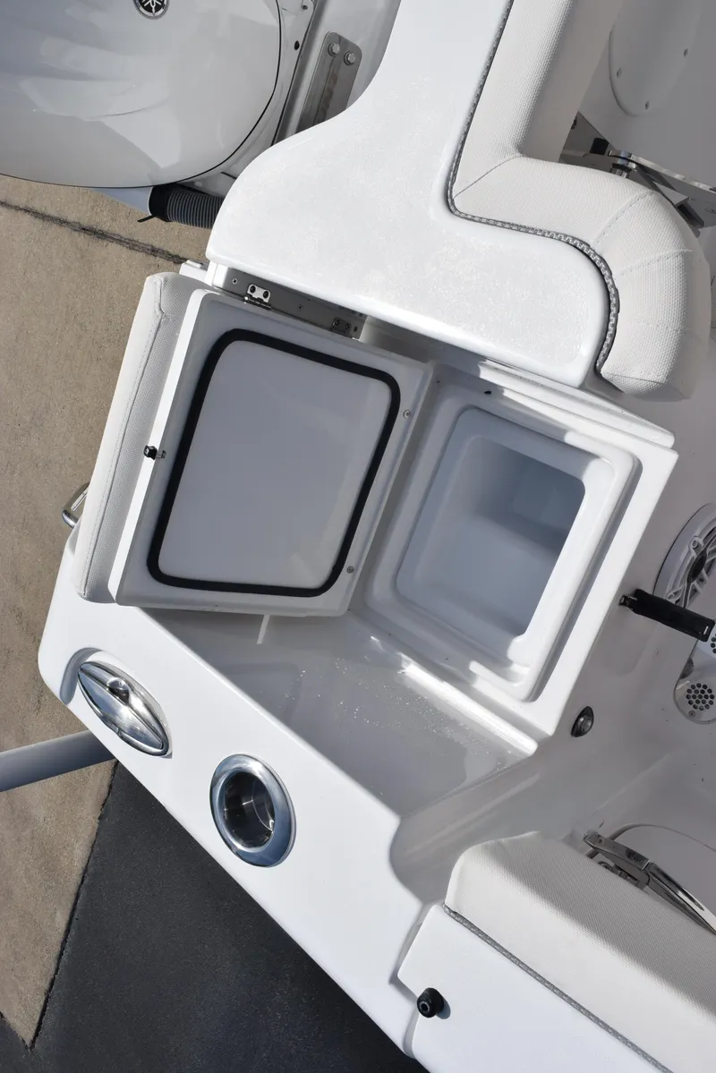 Slide: The Image of Open storage compartment on 2026 Sea Hunt Gamefish 27 Forward Seating boat. - 24