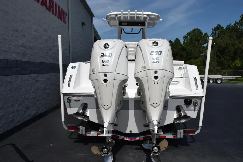 Slide: The Image of 2026 Sea Hunt Gamefish 27 with twin 250 V6 outboard engines, rear view. - 5