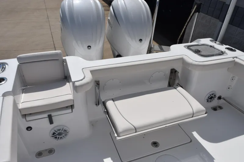 Slide: The Image of 2026 Sea Hunt Gamefish 27 boat with forward seating and dual engines. - 8