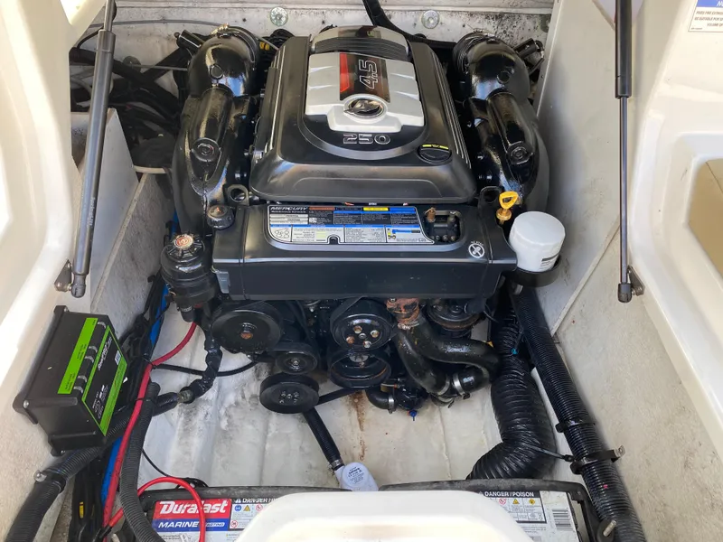 Slide: The Image of Engine compartment of a 2015 Sea Ray 240 Sundeck with Mercury 4.5L engine. - 15