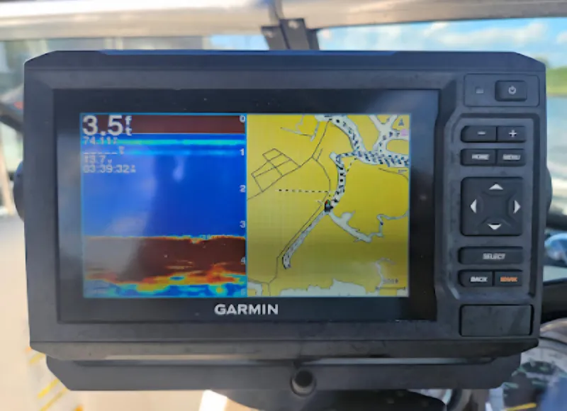 Slide: The Image of Garmin GPS display on 2013 Sea Ray 260 Sundeck showing depth and navigation map. - 15