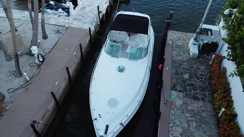 Slide: The Image of 2002 Cruisers Yachts 3372 Express docked at a marina, aerial view. - 7