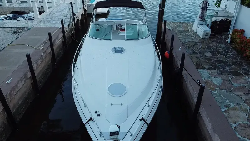 Slide: The Image of 2002 Cruisers Yachts 3372 Express docked at marina, aerial view. - 8