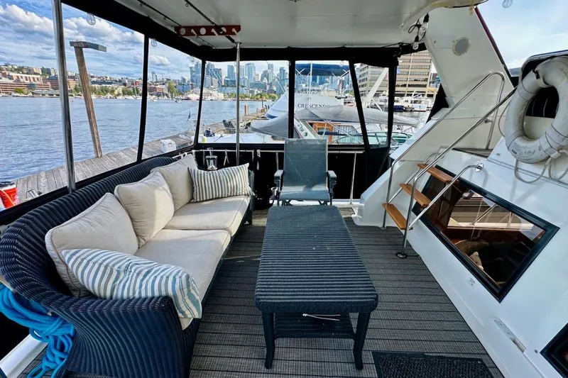 Slide: The Image of Luxurious 1993 Ocean Alexander 460 yacht interior with comfortable seating and scenic waterfront view. - 20