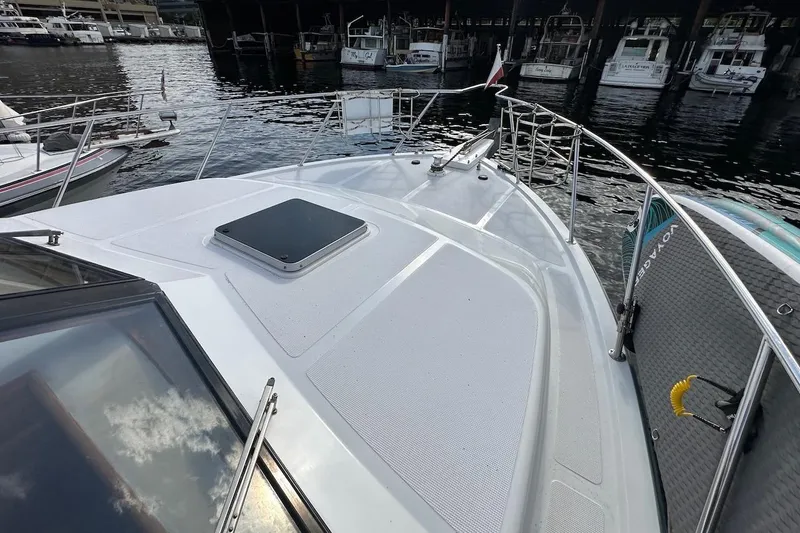 Slide: The Image of Bow view of 1993 Ocean Alexander 460 yacht docked at marina. - 28