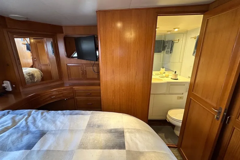 Slide: The Image of Cozy cabin interior of 1993 Ocean Alexander 460 yacht with ensuite bathroom. - 54