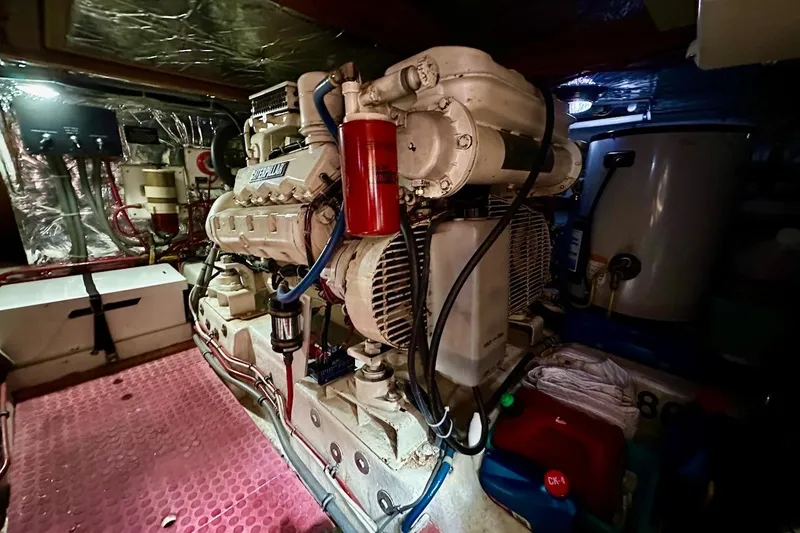Slide: The Image of Engine room of 1993 Ocean Alexander 460 yacht with visible machinery and equipment. - 65