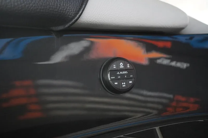 Slide: The Image of 2024 MB B52 23 Classic audio control panel with JL Audio system. - 13