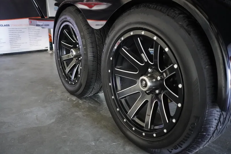 Slide: The Image of 2024 MB B52 23 Classic wheels with black alloy rims and Formula tires. - 17