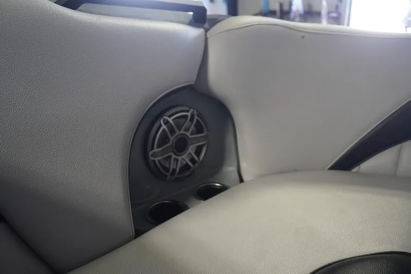 Slide: The Image of 2024 MB B52 23 Classic interior with speaker and cup holders, featuring gray upholstery. - 28