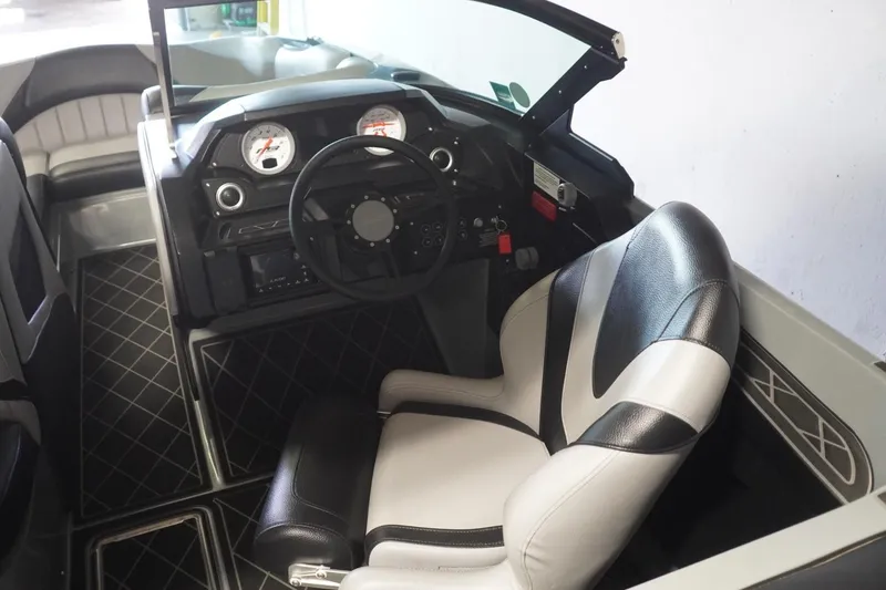 Slide: The Image of 2024 MB B52 23 Classic boat interior with steering wheel and dashboard. - 41