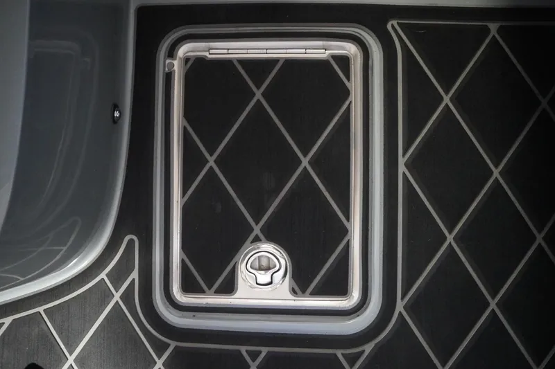 Slide: The Image of 2024 MB B52 23 Classic boat floor with diamond pattern and hatch. - 42