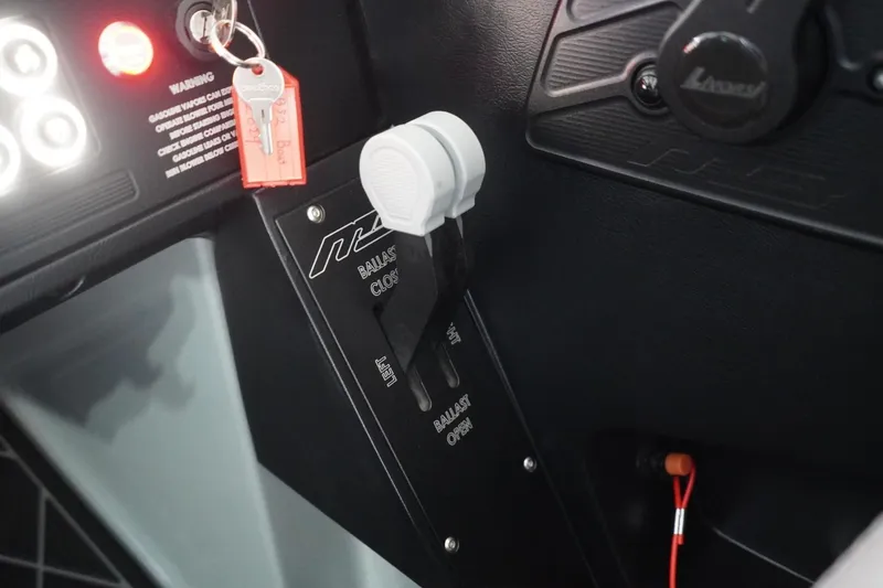 Slide: The Image of 2024 MB B52 23 Classic dashboard with ballast control lever and ignition keys. - 48