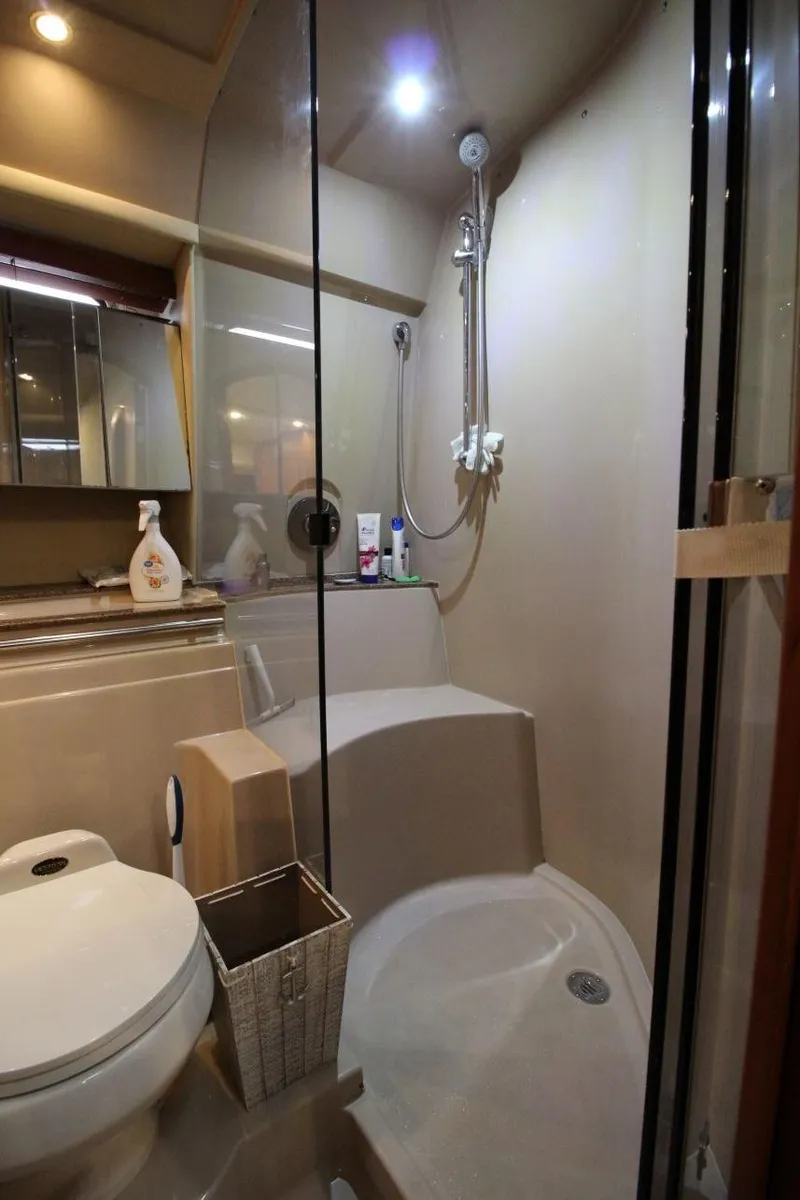Slide: The Image of Bathroom interior of 2002 Cruisers Yachts 4270 Express with shower and toilet. - 28