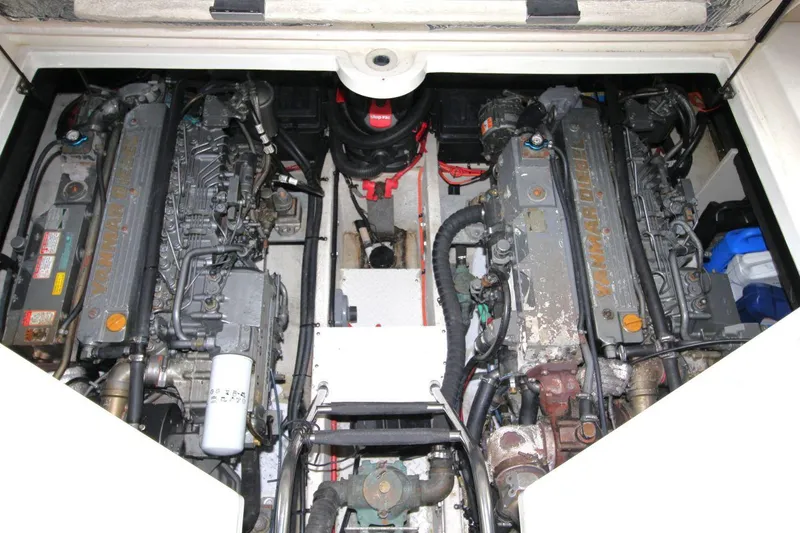 Slide: The Image of Engine compartment of 2002 Cruisers Yachts 4270 Express with dual Yanmar diesel engines. - 32