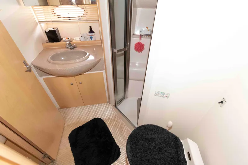 Slide: The Image of Bathroom interior of 1997 Carver 350 Mariner yacht with sink, shower, and toilet. - 20