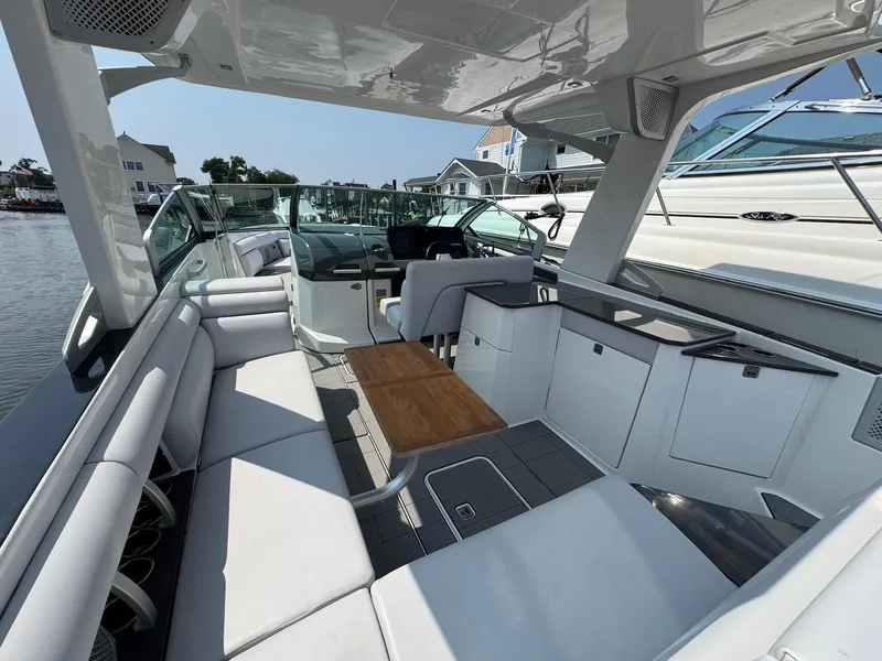 Slide: The Image of 2023 Aviara AV32 OB boat interior with sleek seating and modern design. - 19