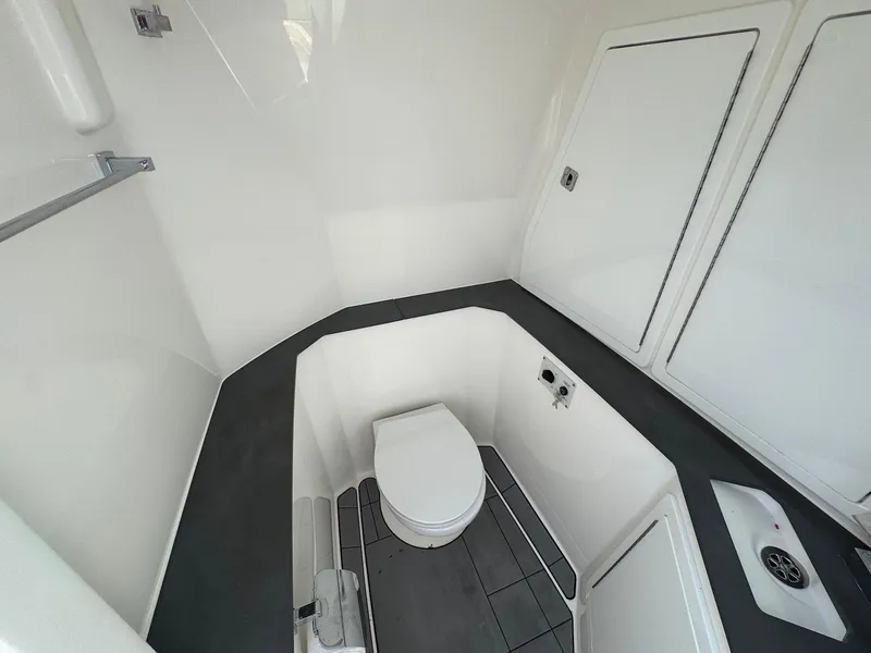 Slide: The Image of 2023 Aviara AV32 OB boat bathroom with modern fixtures and sleek design. - 26