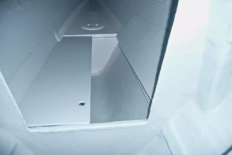 Slide: The Image of Interior view of 2014 Trimaran SeaRail 19, showcasing storage compartment. - 10