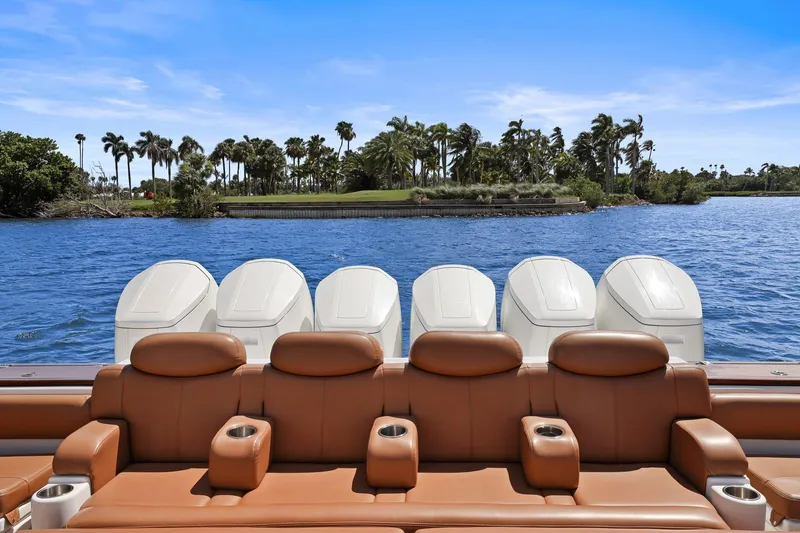 Slide: The Image of Luxury seating on 2023 HCB 65 Estrella boat with five powerful outboard engines. - 22