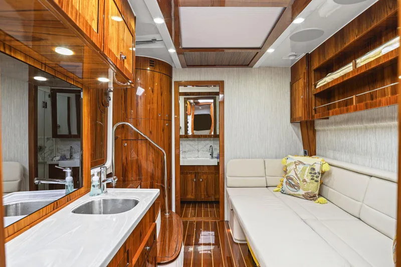 Slide: The Image of Luxurious interior of 2023 HCB 65 Estrella yacht with elegant wood finishes and modern amenities. - 37