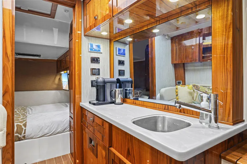 Slide: The Image of Luxurious interior of 2023 HCB 65 Estrella yacht with wood finishes and modern amenities. - 42