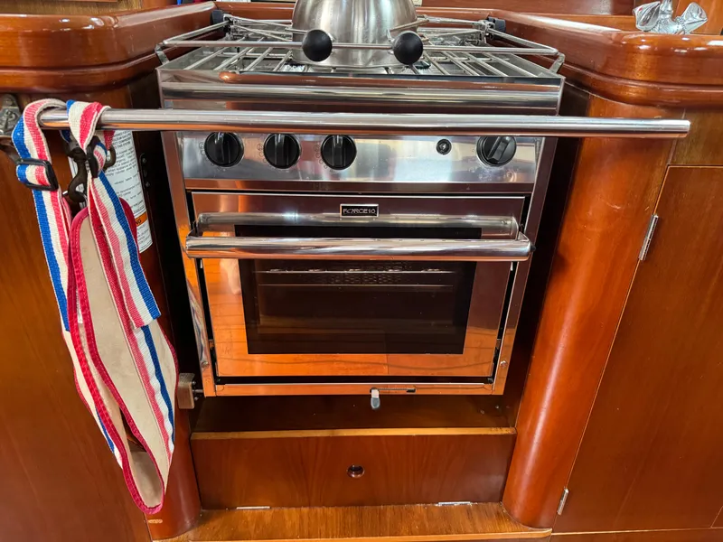 Slide: The Image of Stainless steel stove and oven in 1997 Beneteau Oceanis 461 yacht kitchen. - 15